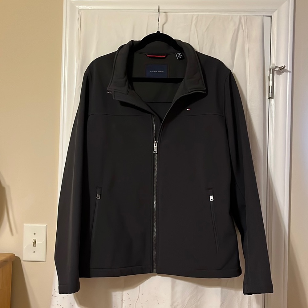 Tommy Hilfiger jacket, full-length zipper at the front and inside pocket.